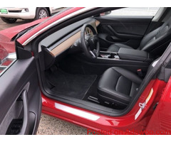 Tesla Model 3 red color 2019