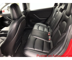 Tesla Model 3 red color 2019