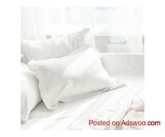 Buy Bulk Pillow Protectors – Dust Mite & Bed Bug Resistant for Hotels